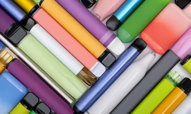 Synthetic nicotine concept. Various disposable electronic cigarettes