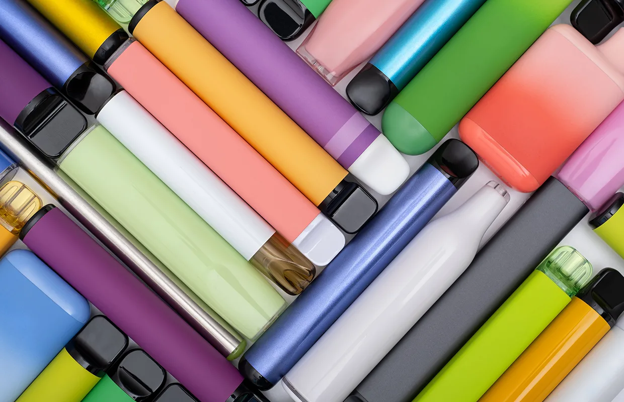 Synthetic nicotine concept. Various disposable electronic cigarettes