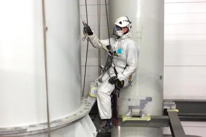 man painting with airbrush